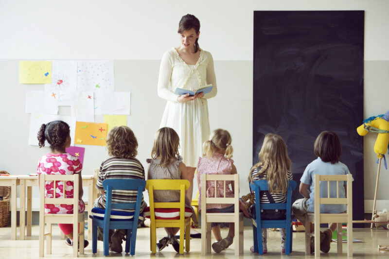 Preschool,Teacher,Reading,To,Students